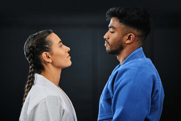 Mma, martial arts and self defense training or practice with a man and woman having a face off in...