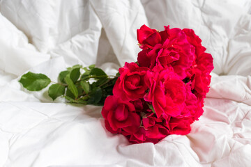 Colorful flower bouquet from red roses isolated on white background. Closeup.