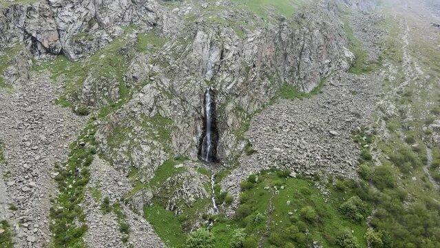 Drone flight over the waterfall in Ala Archa george in Kyrgyzstan