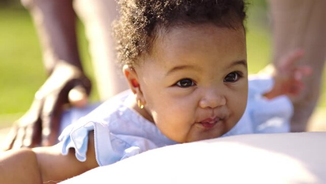 African American toddler's expression on his face with innocence. growth and evolution of children