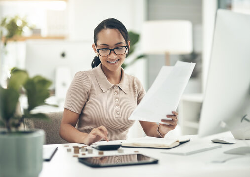 Finance intern, career or financial employee learning her banking budgeting on a calculator. Young accountant, money insurance advisor or investment planner working on tax, cash or accounting papers
