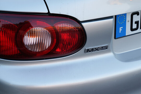 Mazda MX-5 Miata logo brand and text sign convertible classic mx five vintage collector roadster car
