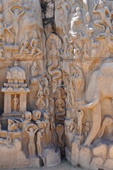 Descent of the Ganges: A giant open-air rock bas relief carved on two monolithic rocks in Mahabalipuram. It contains sculptures of animals, God, people and half-humans carved in the rock relief.