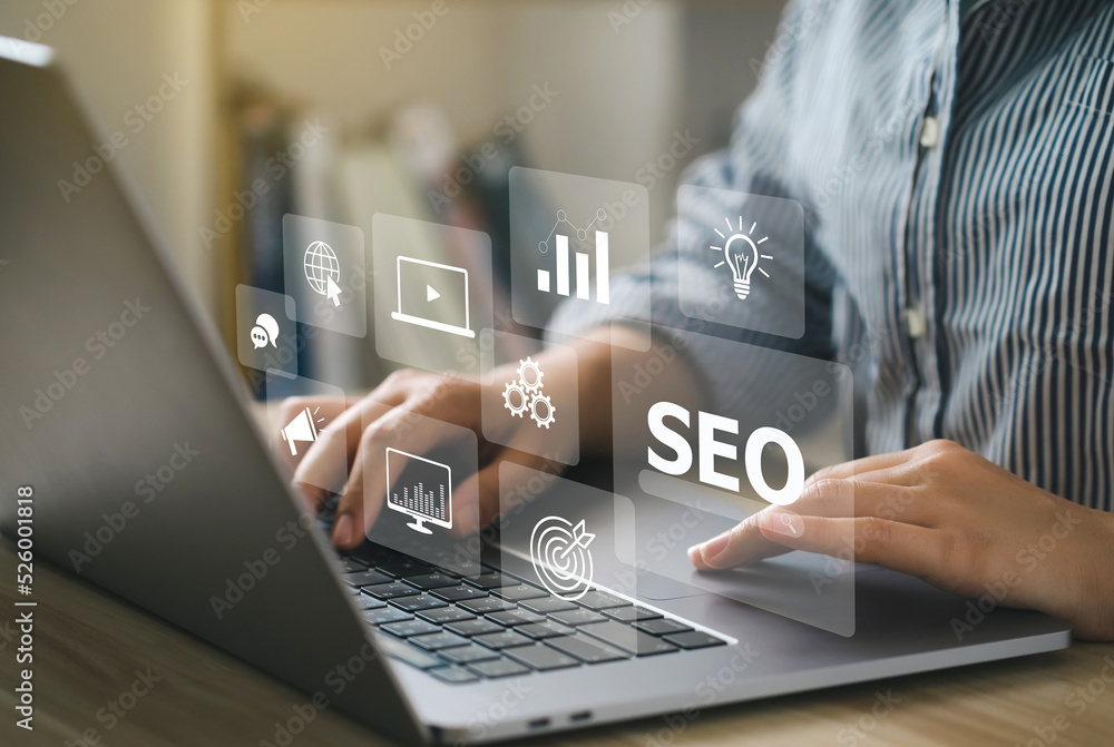 Fototapete seo concept.women using a computer with seo icon for analysis seo search engine optimizing your webs