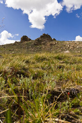Landscape green mountain on blue sky background with white clouds, clean, windows xp style wallpaper