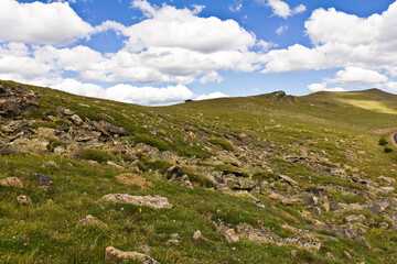 Fototapeta na wymiar Landscape green mountain on blue sky background with white clouds, clean, windows xp style wallpaper