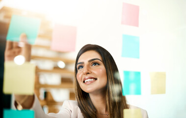 Planning, strategy and creative manager business woman working on idea, solution or project management with post it moodboard design. Happy marketing worker with vision or goal in company development