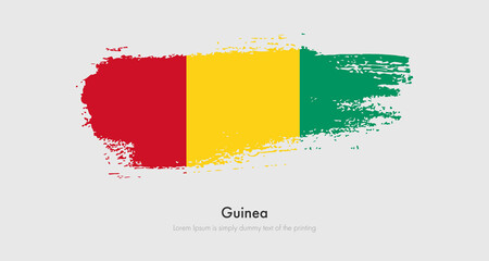 Brush painted grunge flag of Guinea. Abstract dry brush flag on isolated background