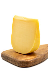Yellow gouda cheese. Hard Dutch gouda cheese, isolated on white background. close up