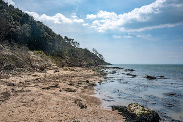 Fototapeta na wymiar Beach erosion near Fort Victoria, Isle of Wight