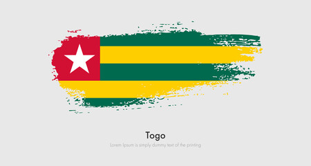 Brush painted grunge flag of Togo. Abstract dry brush flag on isolated background