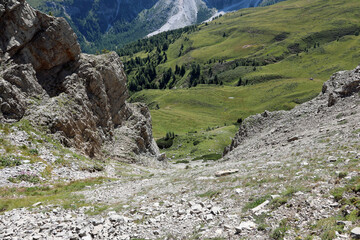 impervious and very steep path along a scree in the Italian Dolomites
