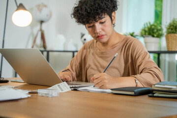 Owners female entrepreneurs check online orders to prepare to pack the boxes,online marketing packing box delivery telemarketing e-commerce,Sme business ideas online.