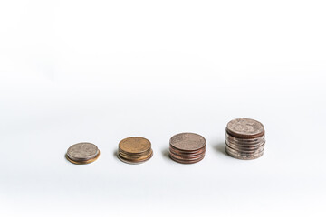 pile of coins on a white background