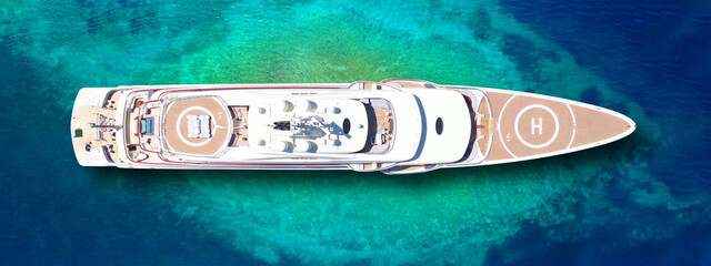 Aerial drone ultra wide panoramic top view photo of large luxury yacht - boat with helicopter...