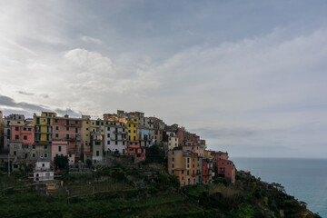 Fototapeta na wymiar Corniglia Cinque Terre national park colorful houses church blue sky