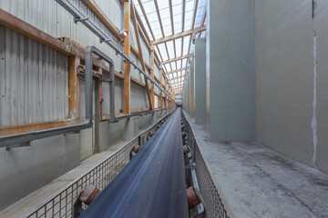 Conveyor belt equipment in chemical plant.