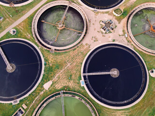 Wastewater treatment plant with round ponds for recycle dirty sewage water, aerial view