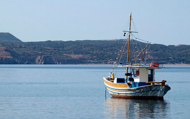 Fototapeta na wymiar A traditional Greek fishing boat 