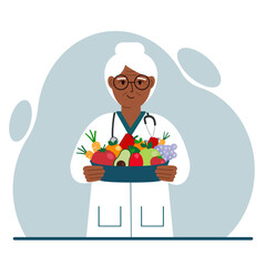 Nutritionist doctor with a bowl of fruits and vegetables. Dietitian