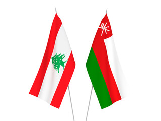 National fabric flags of Lebanon and Sultanate of Oman isolated on white background. 3d rendering illustration.