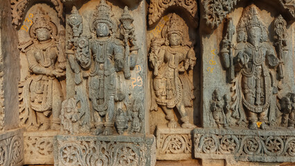 Fototapeta na wymiar The Beautiful Carving Sculptures of Hindu God and Goddess on the Temple of Shri Lakshminarshimha Temple, Javagal, Hassan, Karnataka, India.
