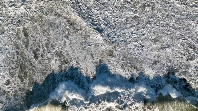 Dramatic Sea Texture 4K filmed on a drone in the Sunrise