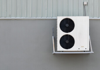 Compressors air conditioners on wall buliding and copy space