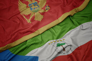 waving colorful flag of equatorial guinea and national flag of montenegro.
