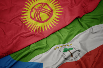 waving colorful flag of equatorial guinea and national flag of kyrgyzstan.