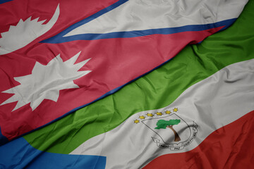 waving colorful flag of equatorial guinea and national flag of nepal.
