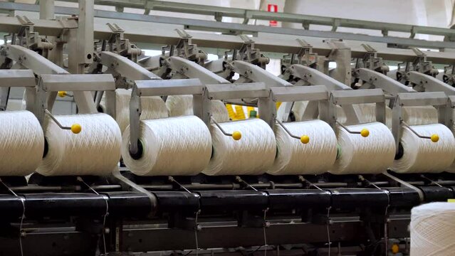 Closeup shot of working machinery in a wool factory