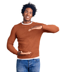 Handsome african american man with afro hair wearing casual clothes gesturing with hands showing...