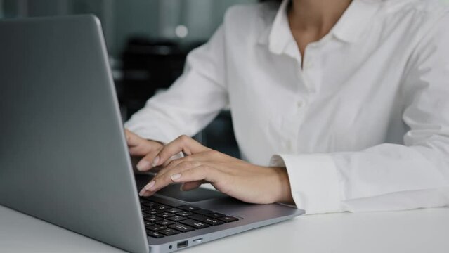 Close-up Female Hands Typing On Laptop Young Businesswoman Working In Office Writing Report Using Computer Application Checking Email Writes Electronic Message Communicates With Client In Social Chat