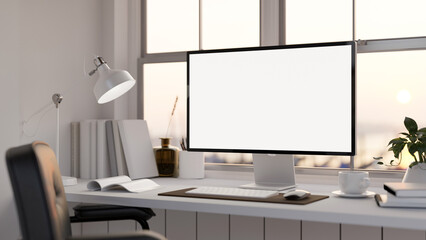 Modern office desk with computer mockup, table lamp, book and accessories over the window