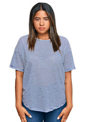 Fototapeta premium Young latin girl wearing casual clothes skeptic and nervous, frowning upset because of problem. negative person.