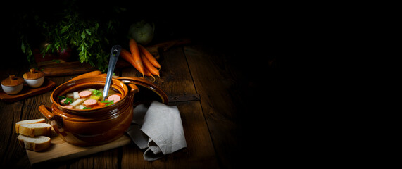 Potato kohlrabi soup with bockwurst