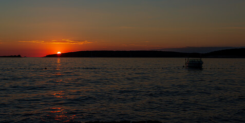 A beauty sunset with a boot 