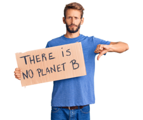 Handsome blond man with beard holding there is no planet b banner with angry face, negative sign showing dislike with thumbs down, rejection concept