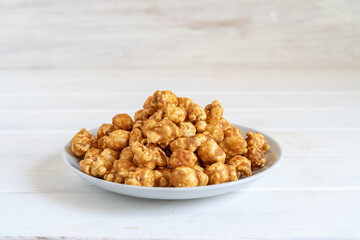 Peanut Butter Popcorn on white background.