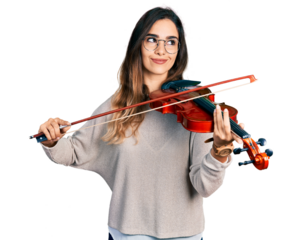 Beautiful hispanic woman playing violin smiling looking to the side and staring away thinking.