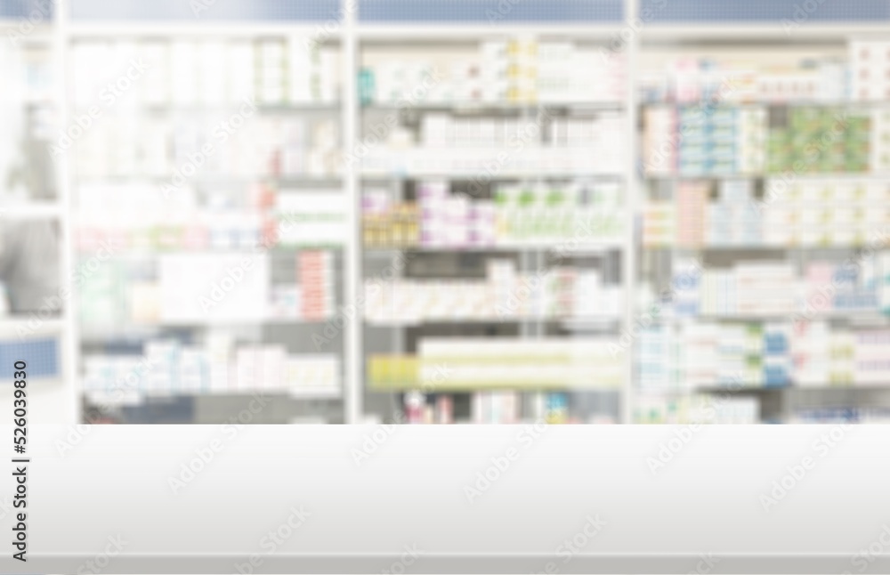 Poster Empty white counter top with blur pharmacy drugstore shelves background