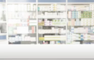Foto op Canvas Empty white counter top with blur pharmacy drugstore shelves background © BillionPhotos.com