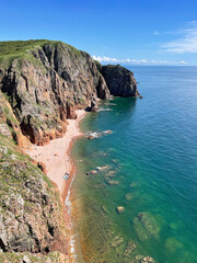 Fototapeta premium Russia, Vladivostok. The south-eastern coast of the island of Shkota in summer in clear weather