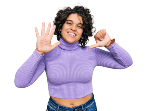 Young hispanic woman with curly hair wearing casual clothes showing and pointing up with fingers number six while smiling confident and happy.