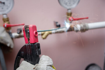 Male welder weld iron pipe radiators, Replacement of the radiator indoor, plumbing work