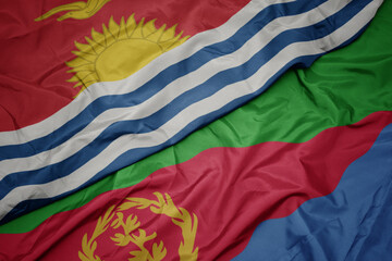 waving colorful flag of eritrea and national flag of Kiribati .