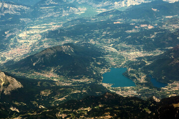 The Alps - the highest and most extensive mountain range system  in Europe. Alps seen from the airplane window