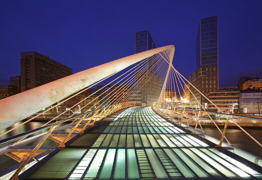 The Zubizuri footbridge (white bridge), also called the Campo Volantin Bridge, across River Nervion, Bilbao, Spain