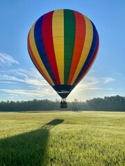hot air balloon over the field
